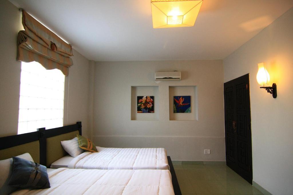 Faifoo Boutique Hotel Cidade de Ho Chi Minh Quarto foto