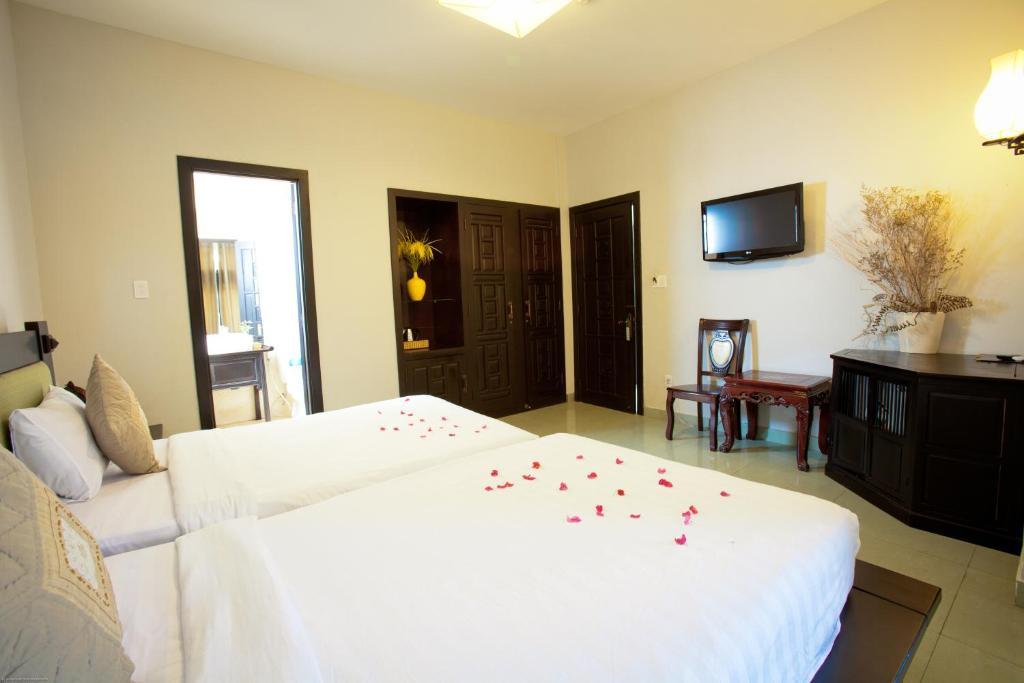 Faifoo Boutique Hotel Cidade de Ho Chi Minh Quarto foto